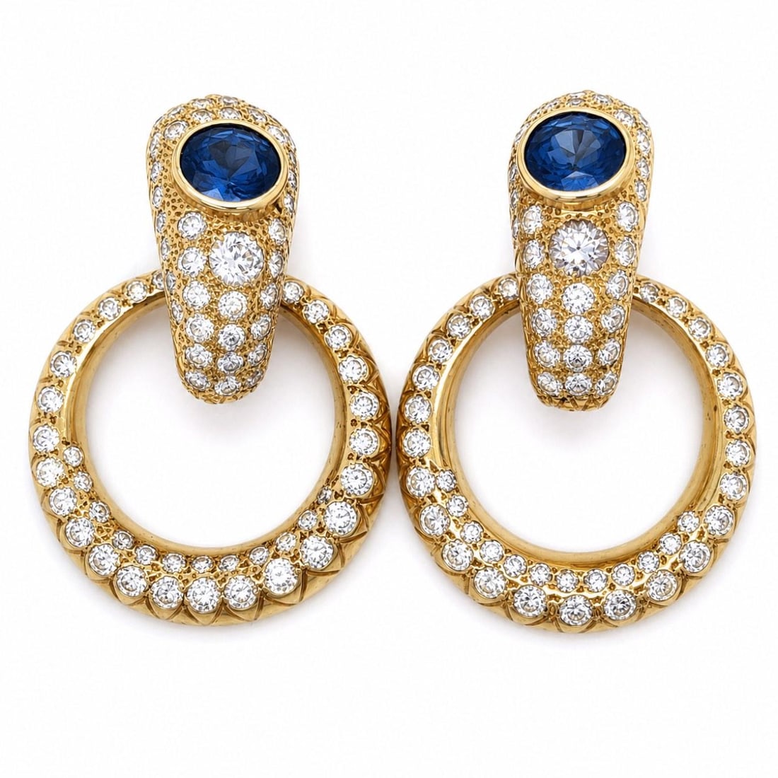 14K Gold Earrings with Sapphire and 176 Diamonds: 14K Gold Earrings with Sapphire and 176 Diamonds These elegant earrings are crafted from 14K yellow gold and feature two sapphires with a total weight of approximately 4.00 carats. They are further ac