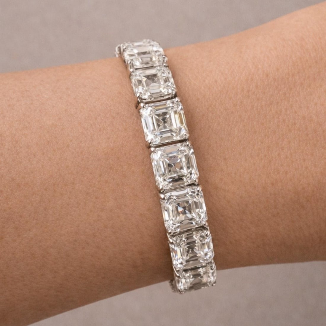 44.00 Carat Ascher Cut Diamond Tennis Bracelet in Platinum: 44.00 Carat Ascher Cut Diamond Tennis Bracelet in Platinum This platinum tennis bracelet features 28 graduated Ascher-cut diamonds totaling approximately 44.00 carats. The diamonds are G-H color with 