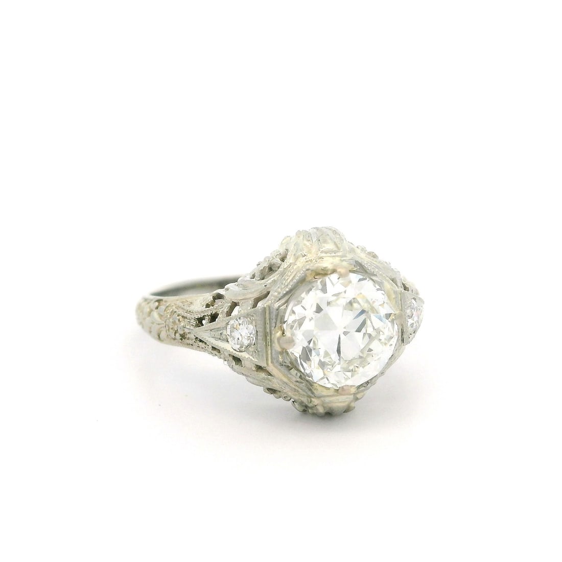 Antique Art Deco 18k White Gold GIA 1.62ctw Diamond Floral Ring: Antique Art Deco 18k White Gold GIA 1.62ctw Diamond Floral Ring This exquisite Antique Art Deco ring features a stunning 1.62ctw of Old European Cut diamonds, showcasing a beautifully intricate floral