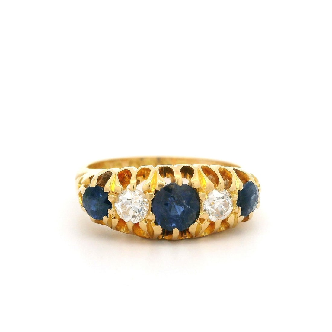 Victorian 18k Gold 1.35ct Sapphire Diamond Band Ring: Victorian 18k Gold 1.35ct Sapphire Diamond Band Ring This exquisite Antique Victorian Band Ring features a stunning combination of natural gemstones and solid 18k yellow gold. The ring showcases three