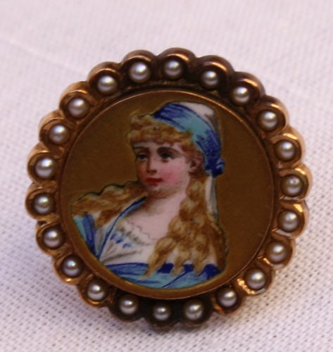 Victorian 14K Gold Enameled Pearl Brooch with Young Girl Design: Victorian 14K Gold Enameled Pearl Brooch with Young Girl Design This exquisite 19th century Victorian brooch is crafted from 14k yellow gold and features stunning enamel work. The brooch showcases a c