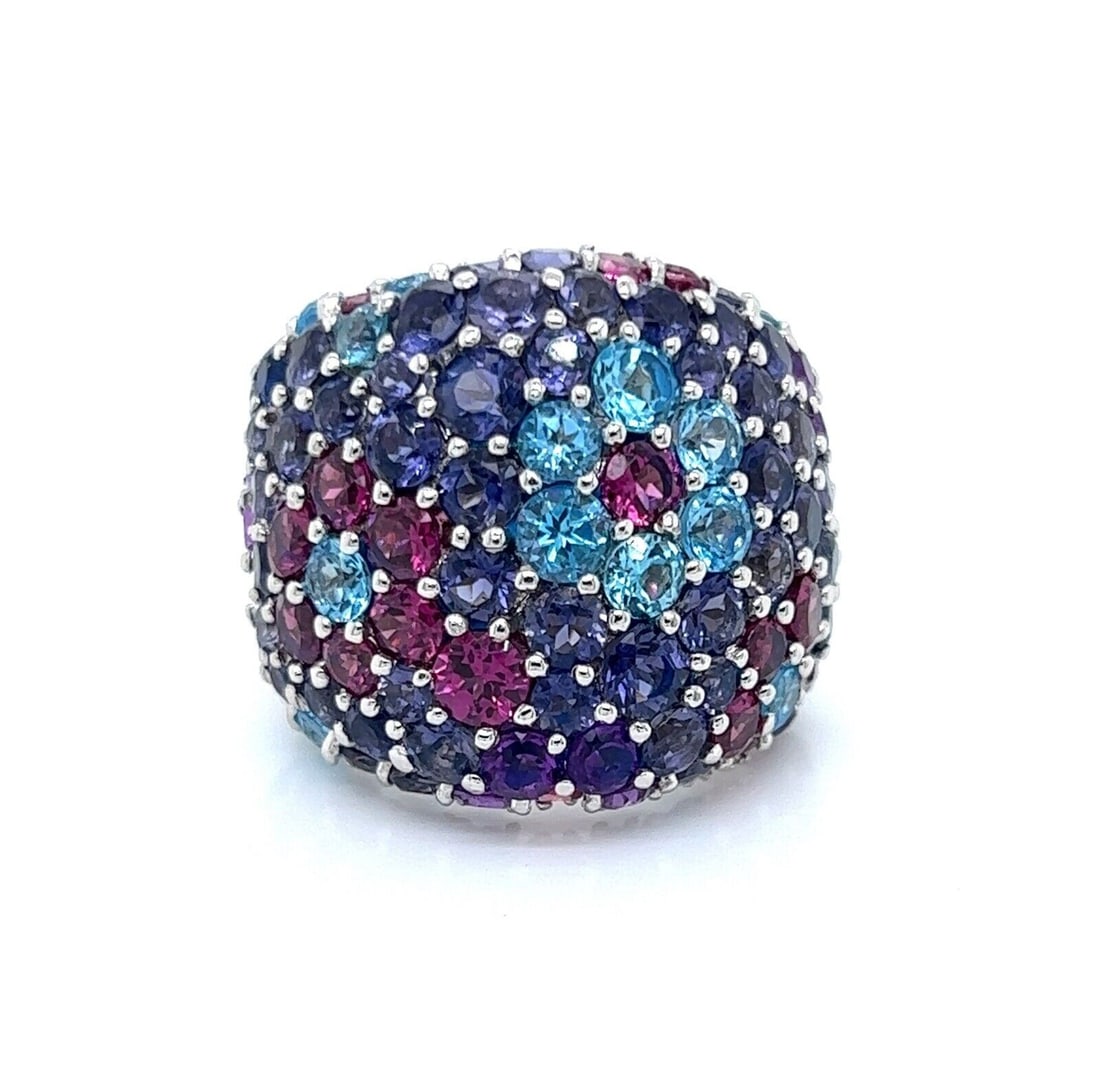 Pasquale Bruni Floral Dome Ring 18k White Gold Multi Gem Size 7: Pasquale Bruni Floral Dome Ring 18k White Gold Multi Gem Size 7 This Pasquale Bruni ring features a sculptural floral dome design in 18k white gold, accented with garnet, iolite, and blue topaz gemsto