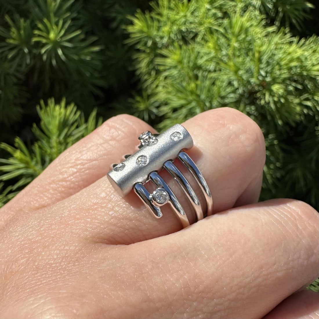 14k white gold diamond wrap band ring size 6 matte bar: 14k white gold diamond wrap band ring size 6 matte bar This elegant wrap style band ring is crafted from solid 14k white gold and features a distinctive matte bar with a polished finish. The ring is s