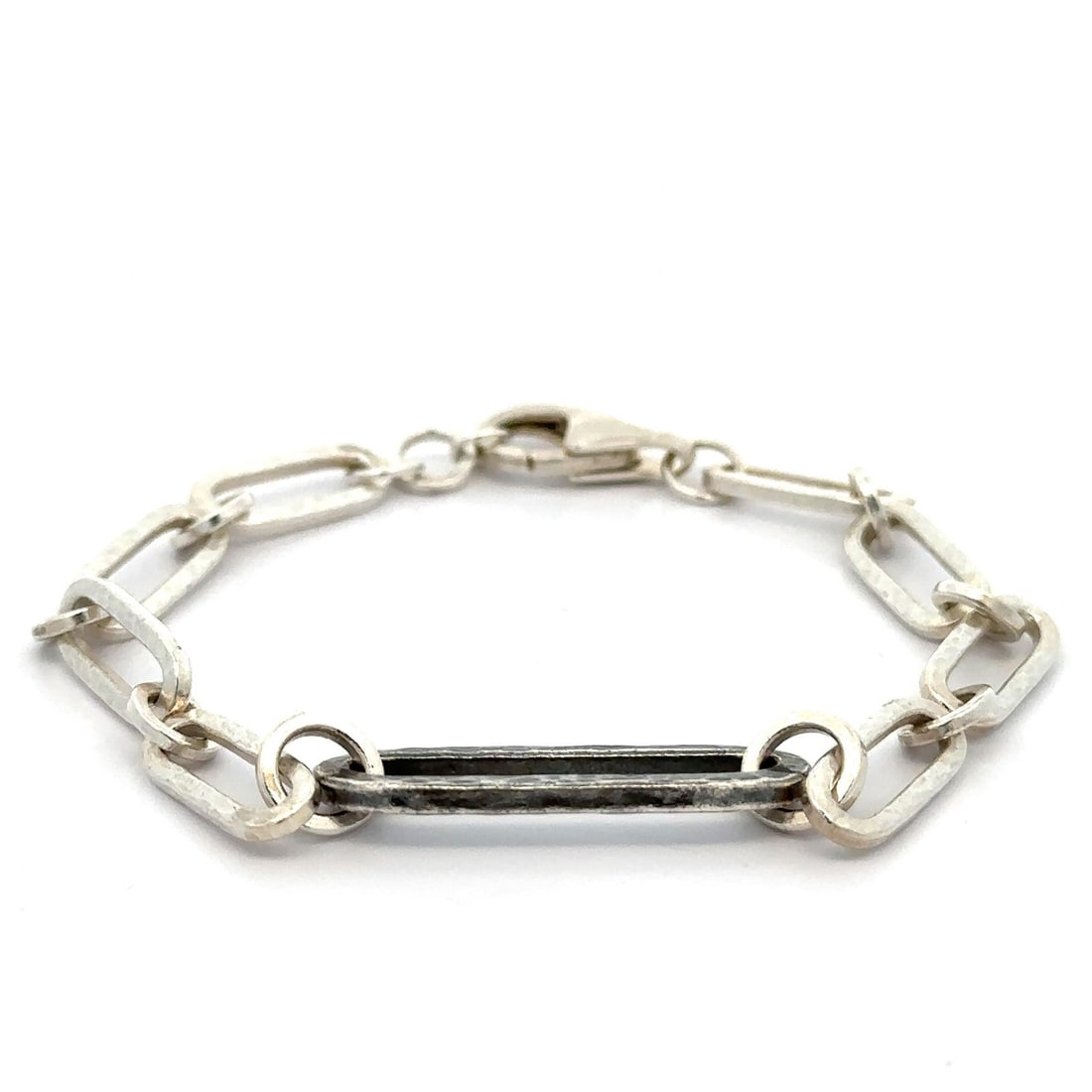 Sterling Silver Paperclip Chain Bracelet with Blackened and Polished Finish: Sterling Silver Paperclip Chain Bracelet with Blackened and Polished Finish This open paperclip link bracelet features a blackened and polished finish crafted from pure sterling silver. It is designed
