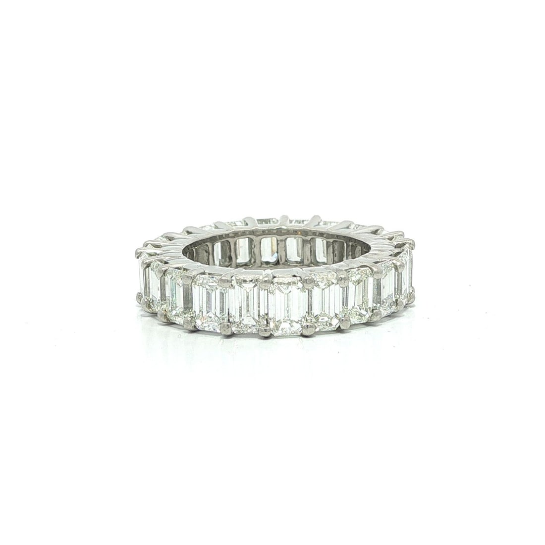 Platinum 7ctw VS Emerald Cut Diamond Eternity Band Ring 6: Platinum 7ctw VS Emerald Cut Diamond Eternity Band Ring 6 This stunning platinum eternity band ring features a total carat weight of approximately 7.0ctw, adorned with 22 natural emerald cut diamonds.