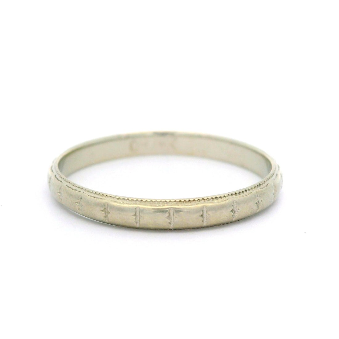 Antique 18k White Gold Band Ring with Milgrain Edges Size 7: Antique 18k White Gold Band Ring with Milgrain Edges Size 7 Presenting a stunning Antique Ostby Barton band ring crafted from solid 18k white gold. This elegant piece features intricately detailed mil