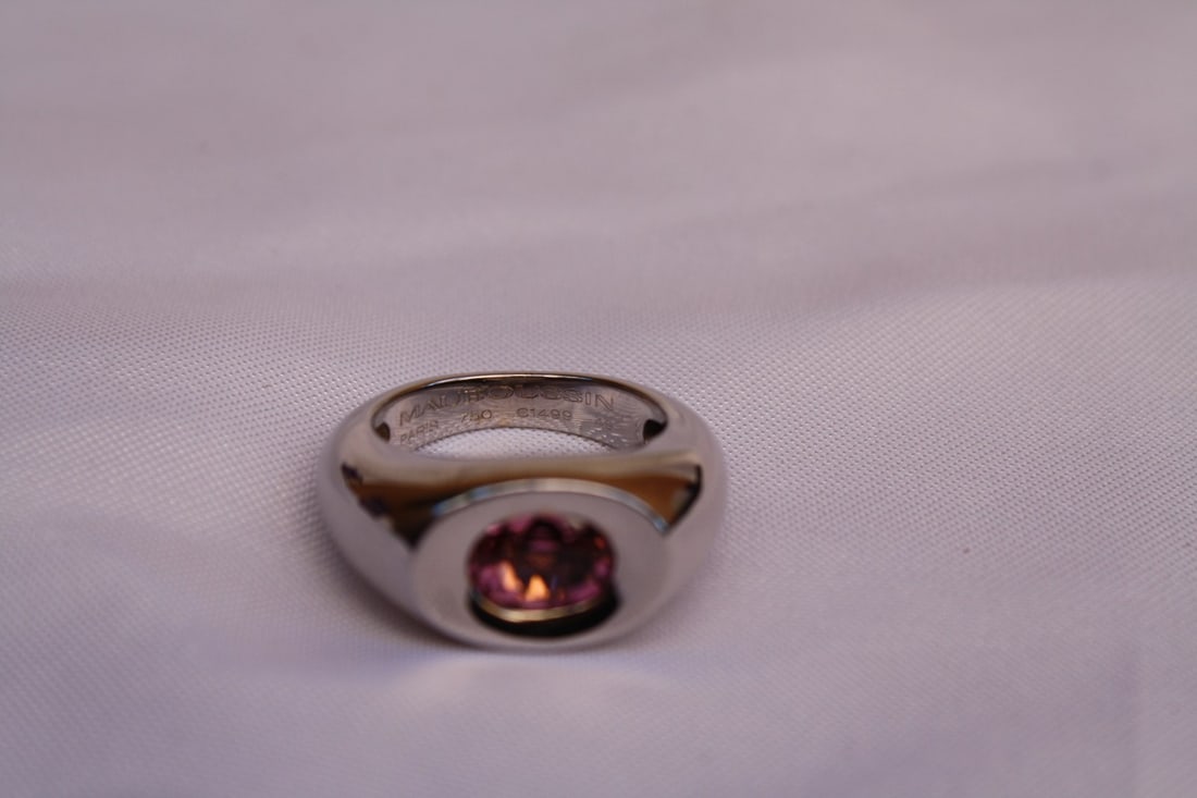 Mauboussin 18K White Gold Tourmaline Ring Size 5.25 with Box: Mauboussin 18K White Gold Tourmaline Ring Size 5.25 with Box Elevate your jewelry collection with this exquisite Mauboussin ring, crafted in France. This stunning piece features a natural white tourma