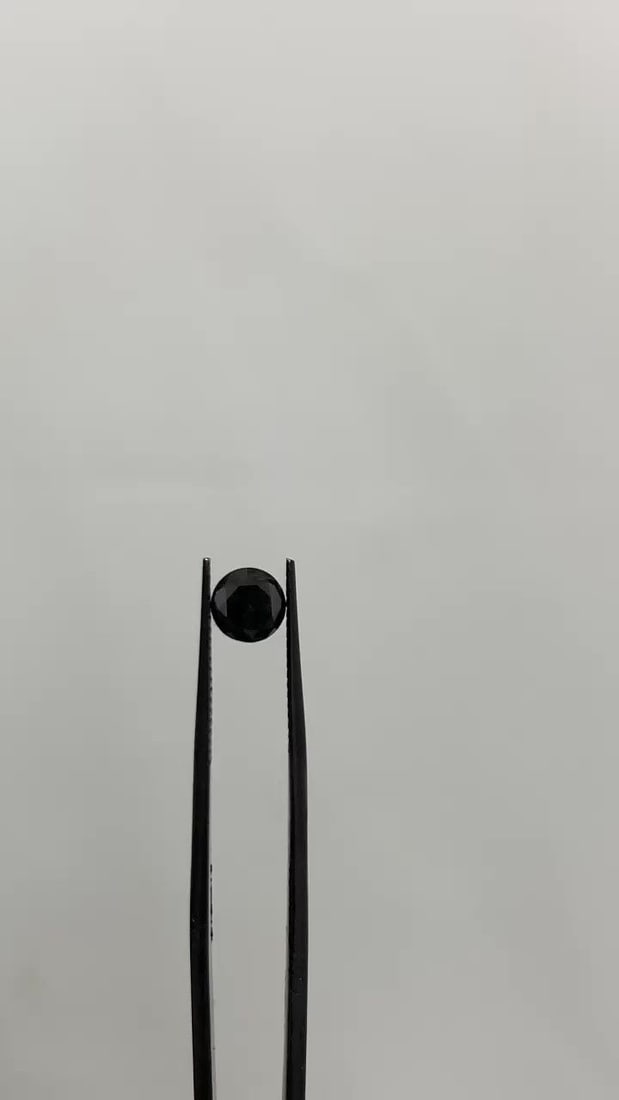 Loose Diamond - ROUND 1.0ct Fancy Black VVS2: Loose Diamond - ROUND 1.0ct Fancy Black VVS2 Source: Natural Shape: ROUND Carats: 1.0 Color: Fancy Black Certification: GIA Video: