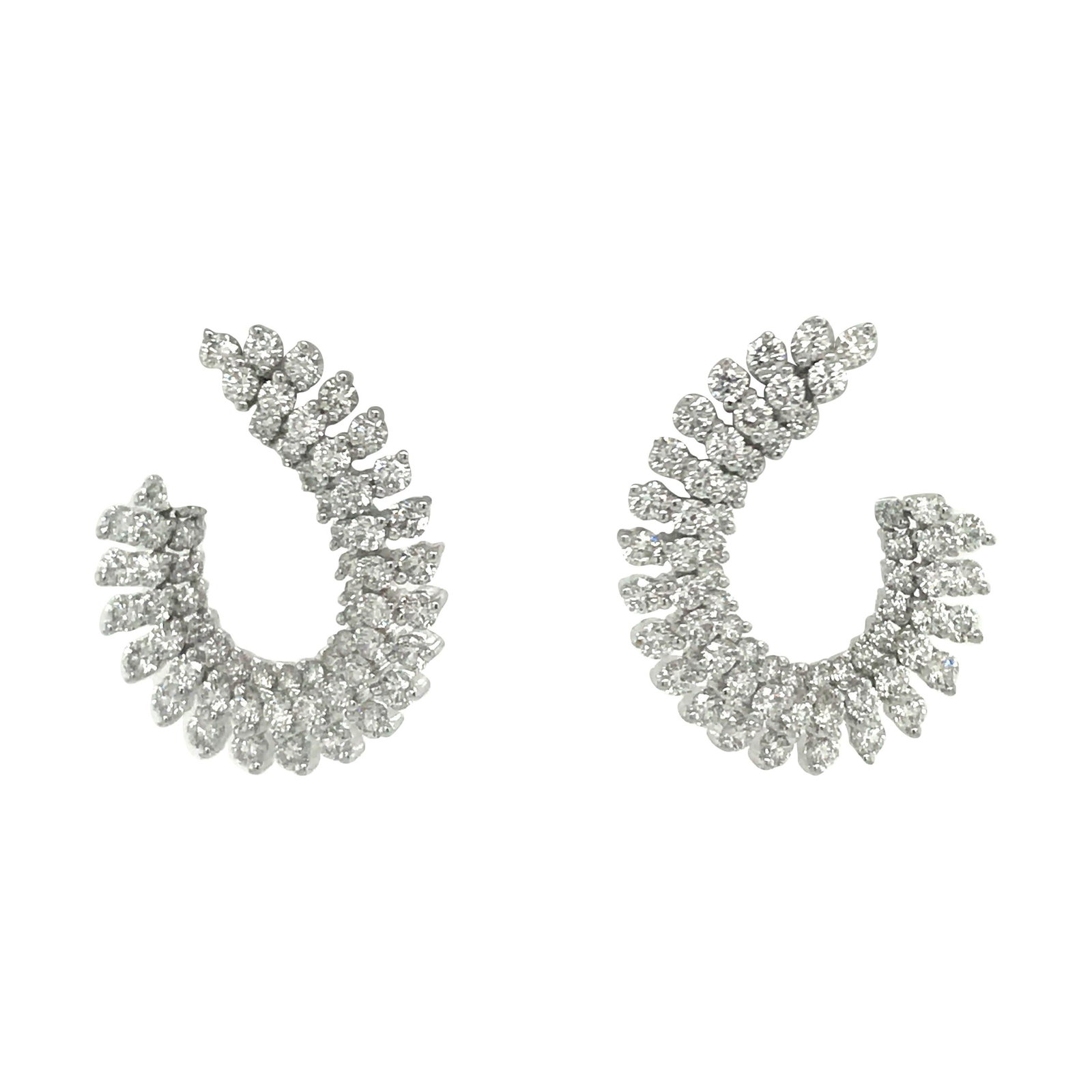 Harbor Diamonds 3.87 Carat Diamond Swirl Earrings in 18K White Gold: Harbor Diamonds 3.87 Carat Diamond Swirl Earrings in 18K White Gold These stunning Diamond Swirl Earrings are crafted in 18K white gold and feature 164 round brilliant diamonds, totaling 3.87 carats. 