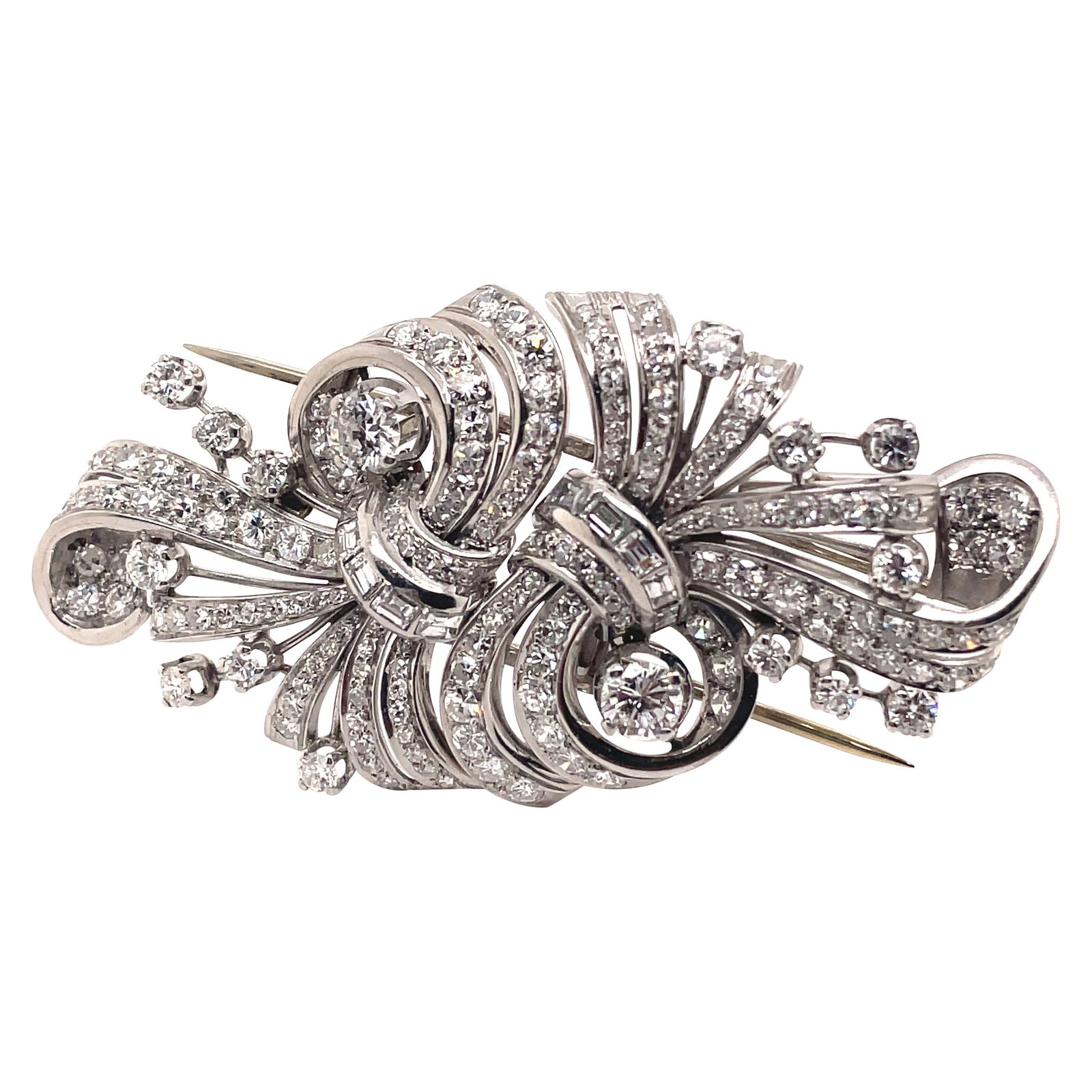 Art Deco Vintage Platinum Diamond Brooch 10.50ct Split Design: Art Deco Vintage Platinum Diamond Brooch 10.50ct Split Design This stunning Art Deco style vintage brooch features a remarkable design that allows it to split into two separate brooches. Crafted from 