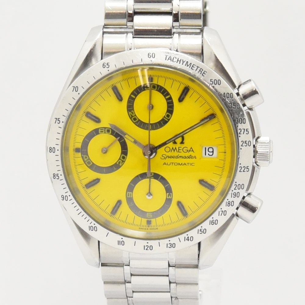 Omega Speedmaster 3511.12 Yellow Dial Automatic Steel Watch: Omega Speedmaster 3511.12 Yellow Dial Automatic Steel Watch This OMEGA Speedmaster 3511.12 Michael Schumacher men's wristwatch features a round yellow dial and a stainless steel case with an approxima