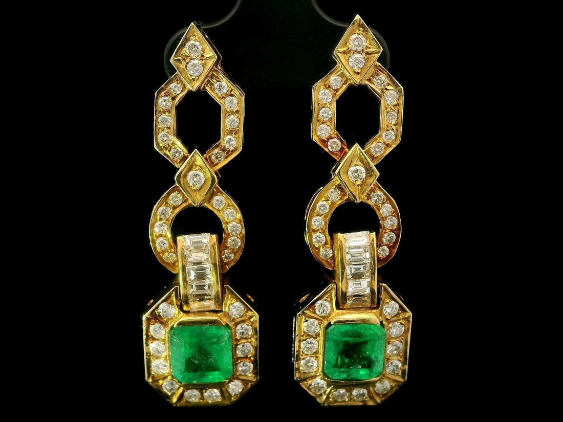 Vintage GIA Certified 4.38ctw Colombian Emerald Diamond Dangle Earrings: Vintage GIA Certified 4.38ctw Colombian Emerald Diamond Dangle Earrings These stunning vintage dangle earrings are crafted from solid 18k yellow gold and feature exquisite GIA-certified Colombian emer