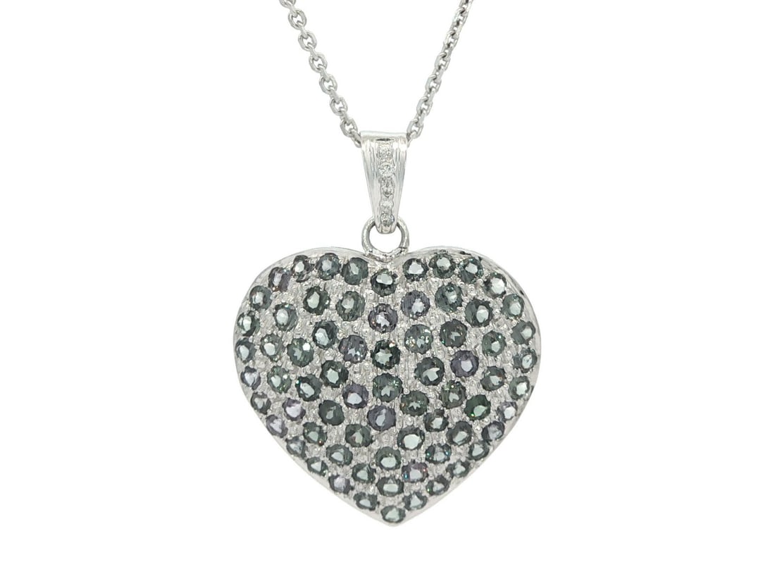 GIA Certified 3.57ct Color Change Garnet Heart Pendant in White Gold: GIA Certified 3.57ct Color Change Garnet Heart Pendant in White Gold This stunning heart pendant necklace features a large natural genuine pyrope spessartine garnet, boasting a total carat weight of 3