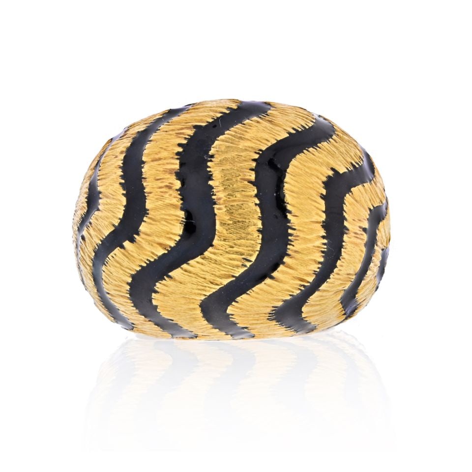 1970s David Webb Black Enamel Dome Ring in 18K Yellow Gold: 1970s David Webb Black Enamel Dome Ring in 18K Yellow Gold This estate dome ring by David Webb is crafted in 18K yellow gold and features a bold black enamel zigzag pattern reminiscent of zebra stripe
