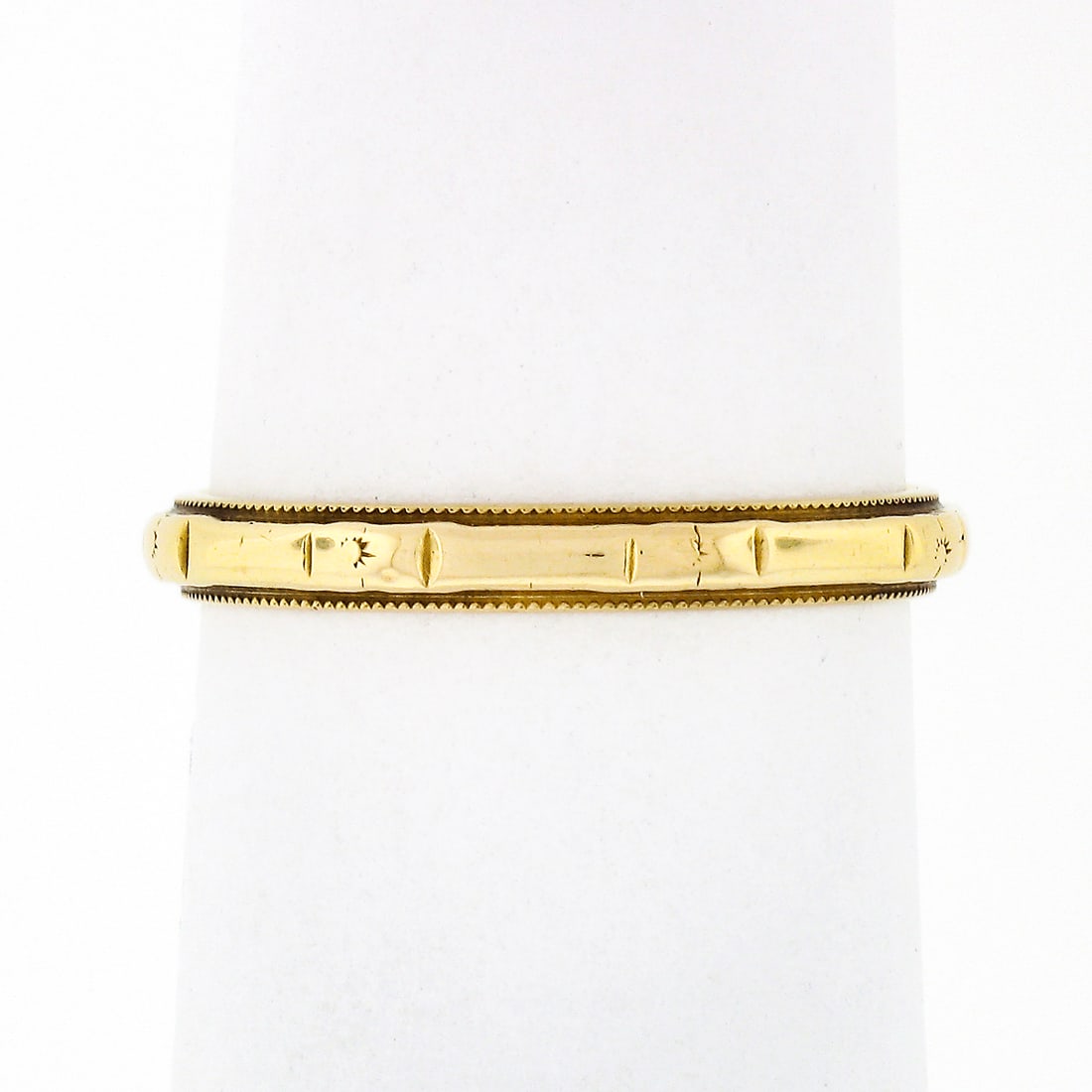 Antique Art Deco 18k Yellow Gold Wavy Milgrain Wedding Band Ring: Antique Art Deco 18k Yellow Gold Wavy Milgrain Wedding Band Ring This exquisite Antique Art Deco wedding band ring is crafted from solid 18k yellow gold. It features a unique wavy grooved top with mil