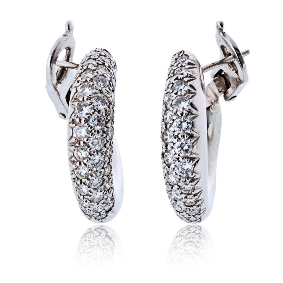 18K White Gold Diamond Hoop Earrings by Van Cleef & Arpels 1980s 1ctw: 18K White Gold Diamond Hoop Earrings by Van Cleef & Arpels 1980s 1ctw These Van Cleef & Arpels hoop earrings from the 1980s are crafted in 18K white gold and feature pave-set diamonds totaling approxi