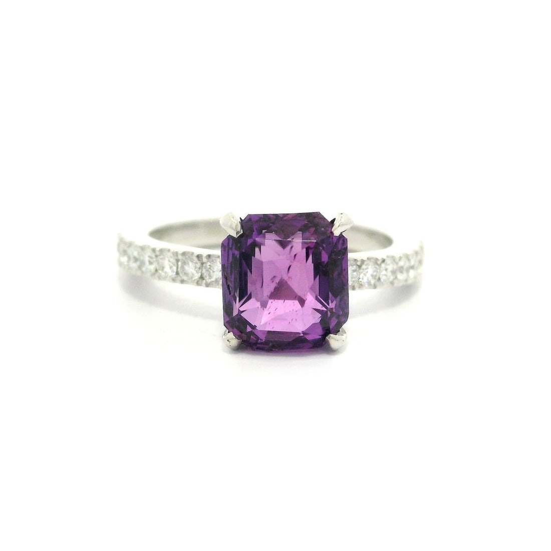 Platinum GIA 3.03ct No Heat Pinkish Purple Sapphire Diamond Ring: Platinum GIA 3.03ct No Heat Pinkish Purple Sapphire Diamond Ring This exquisite ring features a stunning natural sapphire, showcasing a vivid pinkish-purple hue. The octagonal step cut sapphire, weigh