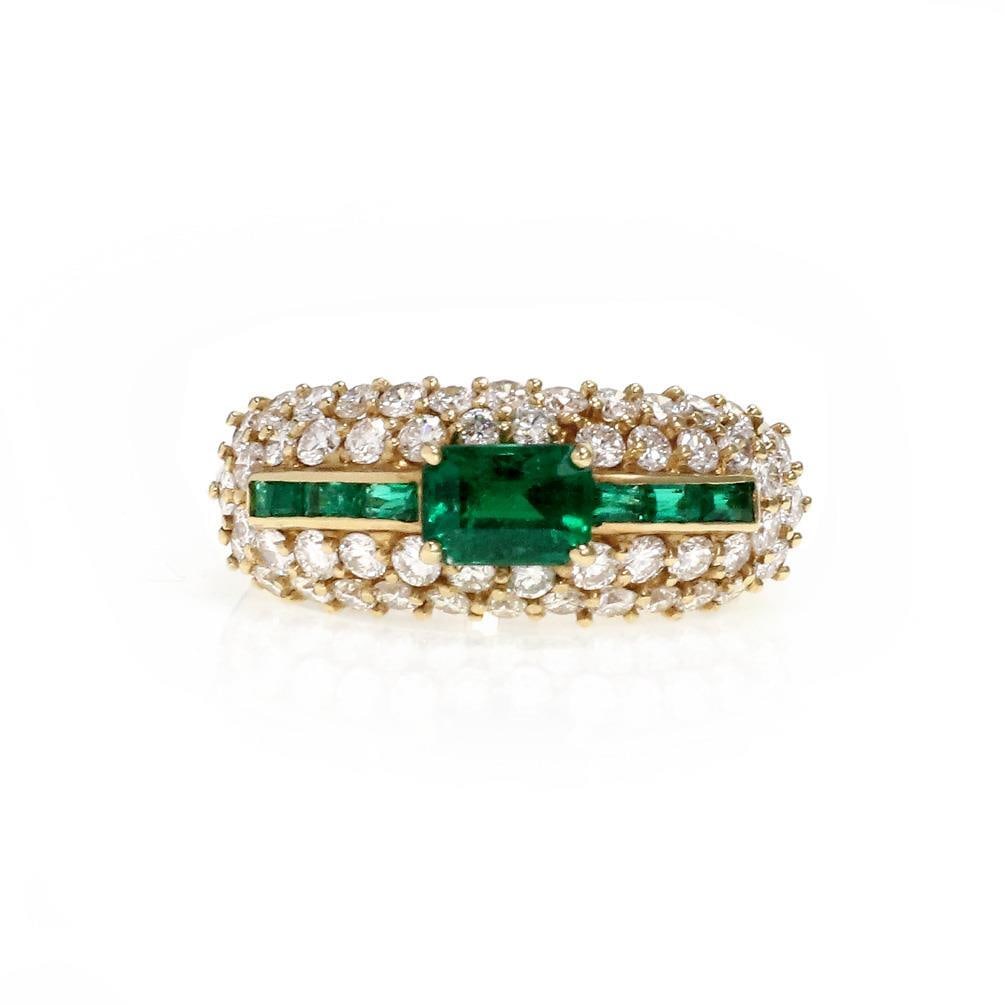 18k Yellow Gold 2.40ct Diamond Emerald Cocktail Ring Size 7: 18k Yellow Gold 2.40ct Diamond Emerald Cocktail Ring Size 7 This stunning dome band ring features a captivating design crafted from 18k yellow gold. The front showcases a series of elongated emerald g