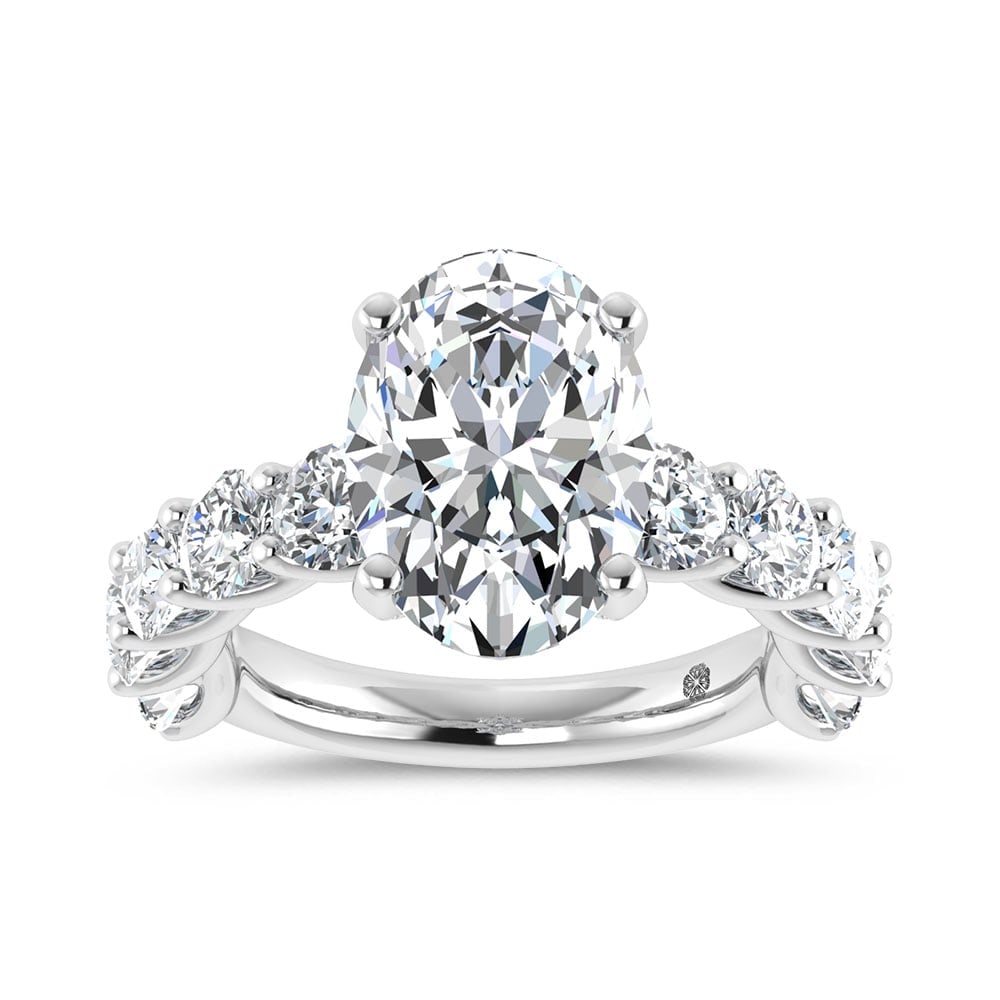14K White Gold 7 3/4 Ct.Tw. Lab Grown Diamond Engagement Ring (IGI Certified Center 5ct): 14K White Gold 7 3/4 Ct.Tw. Lab Grown Diamond Engagement Ring (IGI Certified Center 5ct) This elegant diamond engagement ring crafted in 14k White gold, features a Oval -cut center stone of 5 ct that 