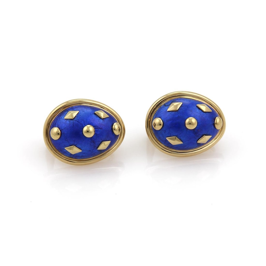 Tiffany & Co. Schlumberger 18k Yellow Gold Blue Enamel Earrings: Tiffany & Co. Schlumberger 18k Yellow Gold Blue Enamel Earrings These exquisite Tiffany & Co. earrings, designed by Schlumberger, are crafted from luxurious 18k yellow gold. The earrings showcase a ca