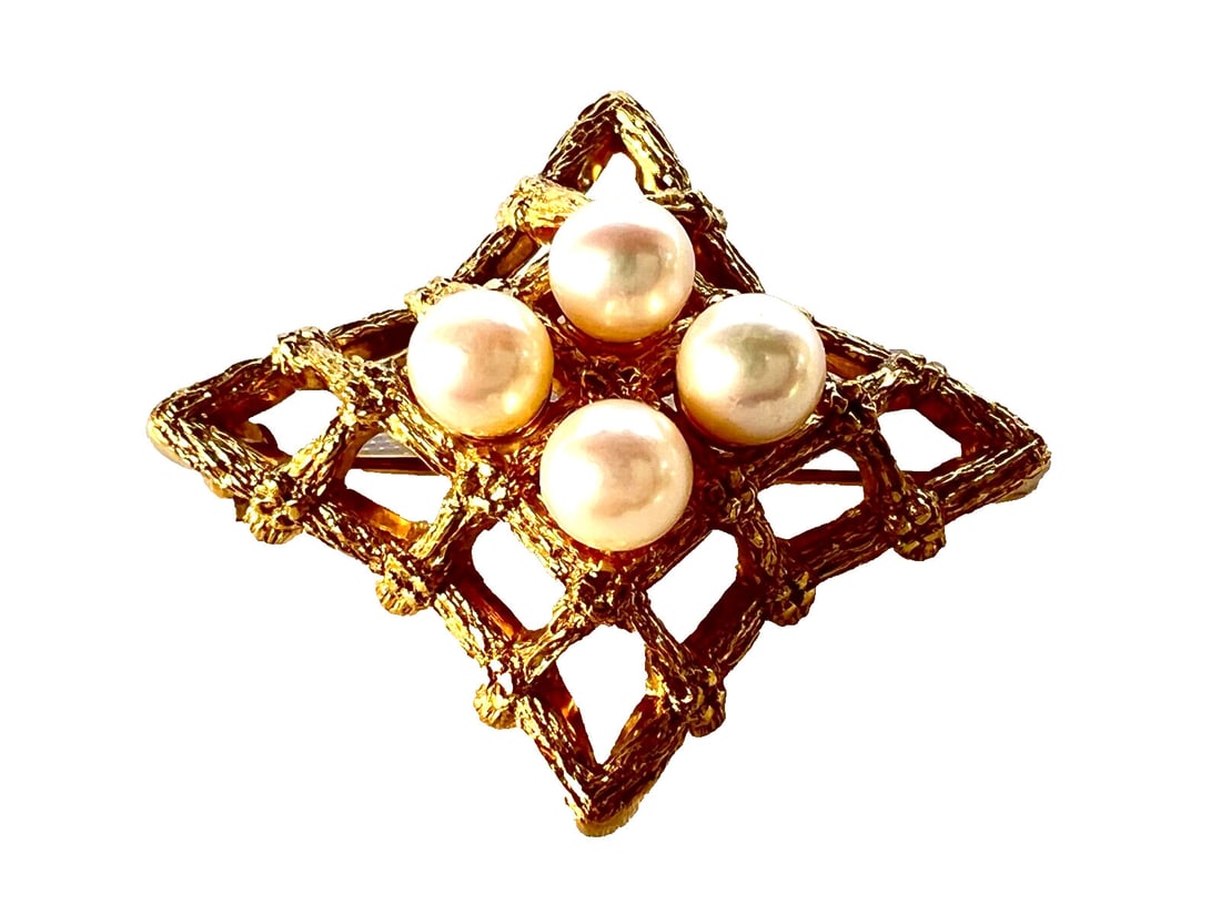 German 14K Yellow Gold Pearl Brooch with MP Signature: German 14K Yellow Gold Pearl Brooch with MP Signature This exquisite brooch showcases the artistry of German craftsmanship, featuring a stunning arrangement of four pearls set in 14K yellow gold. Each