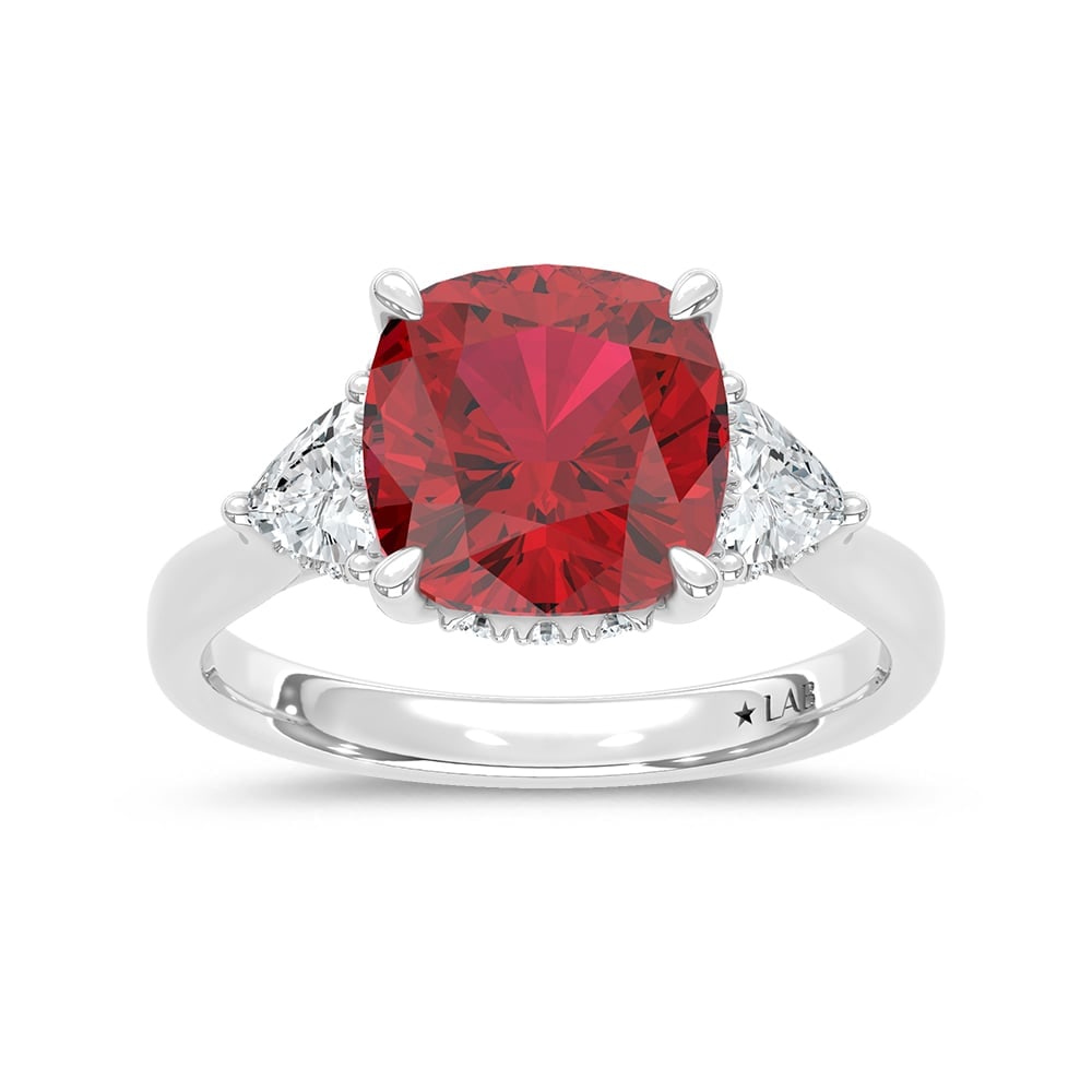 14K White Gold Lab Grown Diamond 5 1/5 Ct.Tw. Cushion Shape Recrystalized Ruby Engagement Ring: 14K White Gold Lab Grown Diamond 5 1/5 Ct.Tw. Cushion Shape Recrystalized Ruby Engagement Ring (Center 4 1/2 ct) Exude elegance with this 14K white gold engagement ring, featuring a stunning 4 1/2 ct 