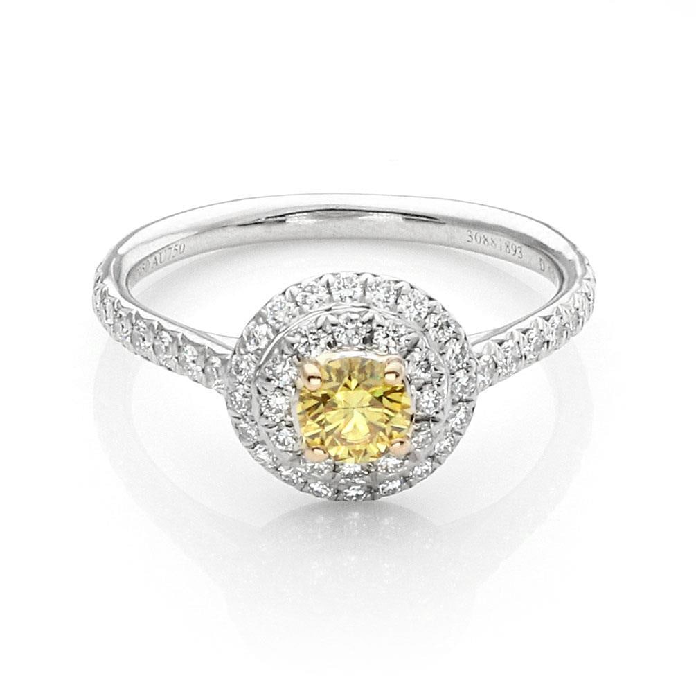 Tiffany & Co. SOLESTE Platinum Ring Fancy Intense Yellow Diamond 0.22ct: Tiffany & Co. SOLESTE Platinum Ring Fancy Intense Yellow Diamond 0.22ct This exquisite ring from Tiffany & Co.'s SOLESTE collection features a stunning 0.22 ct Fancy Intense Yellow diamond at its cent