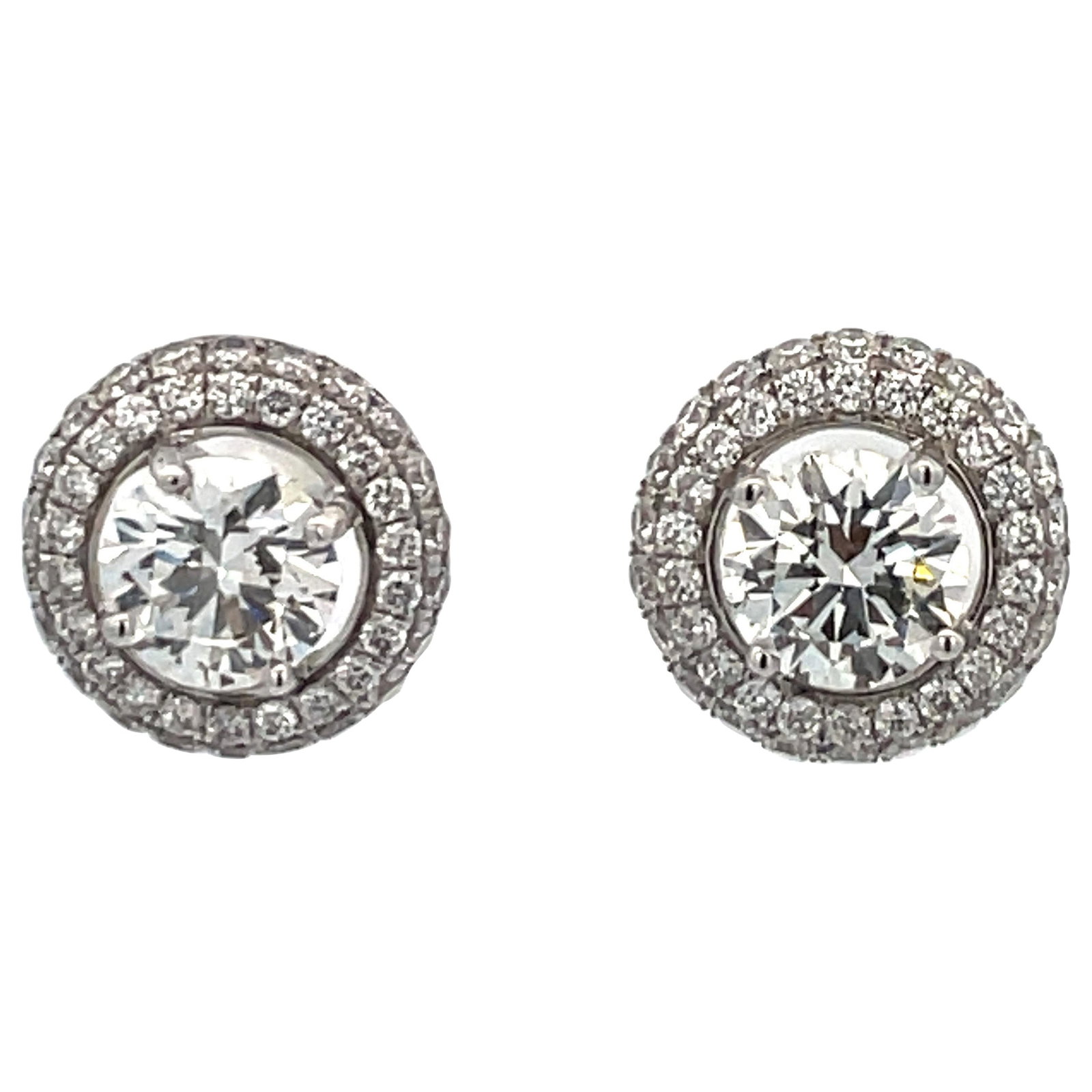 GIA Certified 2.01 Carat Diamond Stud Earrings 18K White Gold: GIA Certified 2.01 Carat Diamond Stud Earrings 18K White Gold Elevate your elegance with these stunning GIA Certified Diamond Stud Earrings, featuring a total weight of 2.01 carats. Crafted from luxur