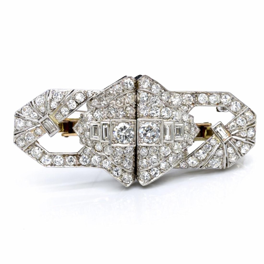 Convertible Art Deco Platinum 18K Gold Diamond Brooch with Detachable Earrings: Convertible Art Deco Platinum 18K Gold Diamond Brooch with Detachable Earrings This Art Deco set features brooch clips that can be separated and worn as earrings, crafted from platinum and 18K yellow 