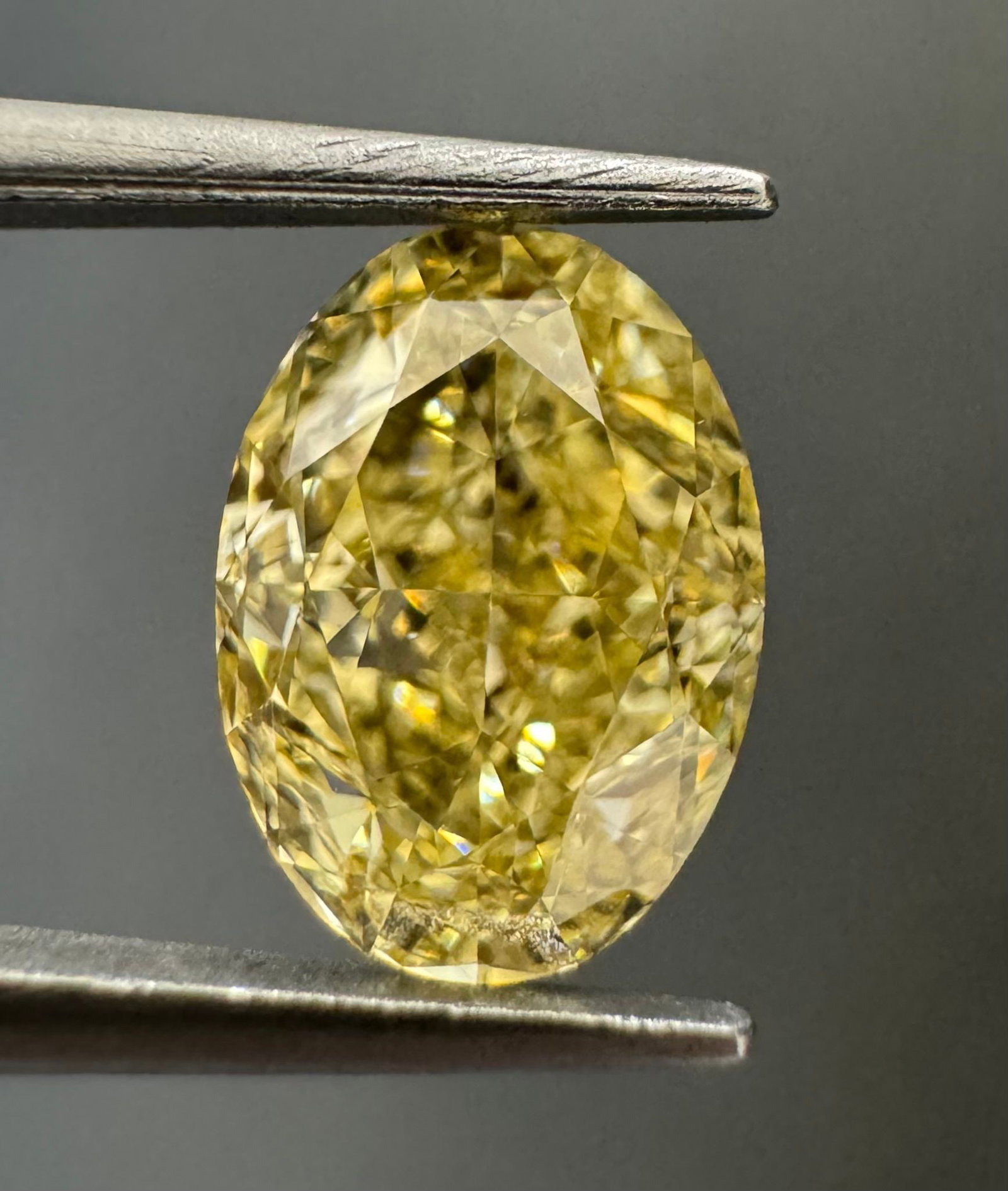 Loose Diamond - OVAL 1.29ct Fancy Yellow VVS2: Loose Diamond - OVAL 1.29ct Fancy Yellow VVS2 Source: Natural Shape: OVAL Carats: 1.29 Color: Fancy Yellow Certification: GIA Video: