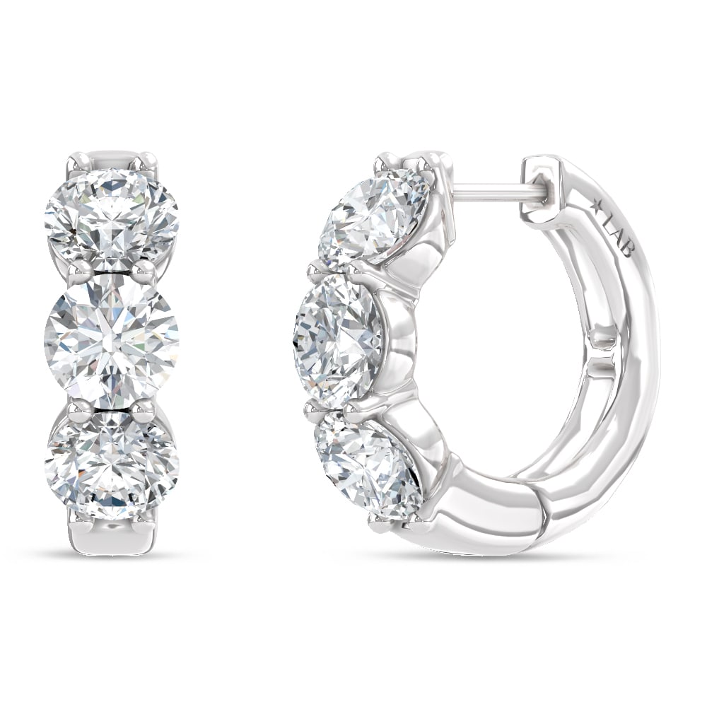 14K White Gold Lab Grown Diamond 2 Ct.Tw. Hoop Earrings: 14K White Gold Lab Grown Diamond 2 Ct.Tw. Hoop Earrings Elegant 14K white gold hoops with 2 Ct.Tw. lab-grown diamonds. 14k White Gold Stone Color: D-f Stone Clarity: Vs This item may take 2-5 weeks fo