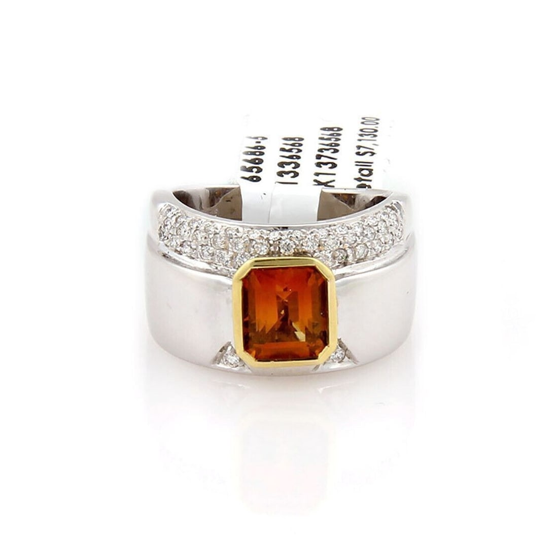 Koesis 18k Two Tone Gold Citrine Diamond Ring Size 7: Koesis 18k Two Tone Gold Citrine Diamond Ring Size 7 This Koesis ring is crafted in 18k yellow and white gold with a two-tone design and features a citrine center accented by diamonds. It is a bold st