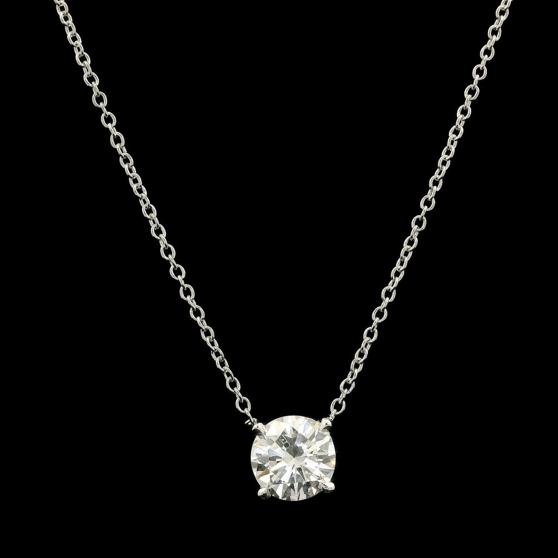 14k White Gold 0.68ct Diamond Solitaire Pendant Necklace: 14k White Gold 0.68ct Diamond Solitaire Pendant Necklace This exquisite necklace features a stunning solitaire pendant showcasing a natural round brilliant cut diamond. The pendant is elegantly crafte
