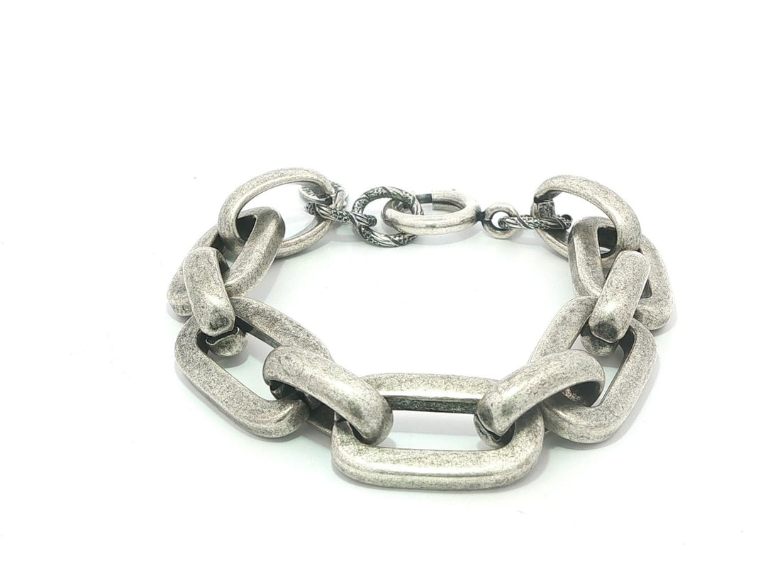Sterling Silver Paperclip Link Chain Bracelet by Catherine Popesco France: Sterling Silver Paperclip Link Chain Bracelet by Catherine Popesco France This women's bracelet features an oval open paperclip link chain crafted from sterling silver. It is secured with a spring rin