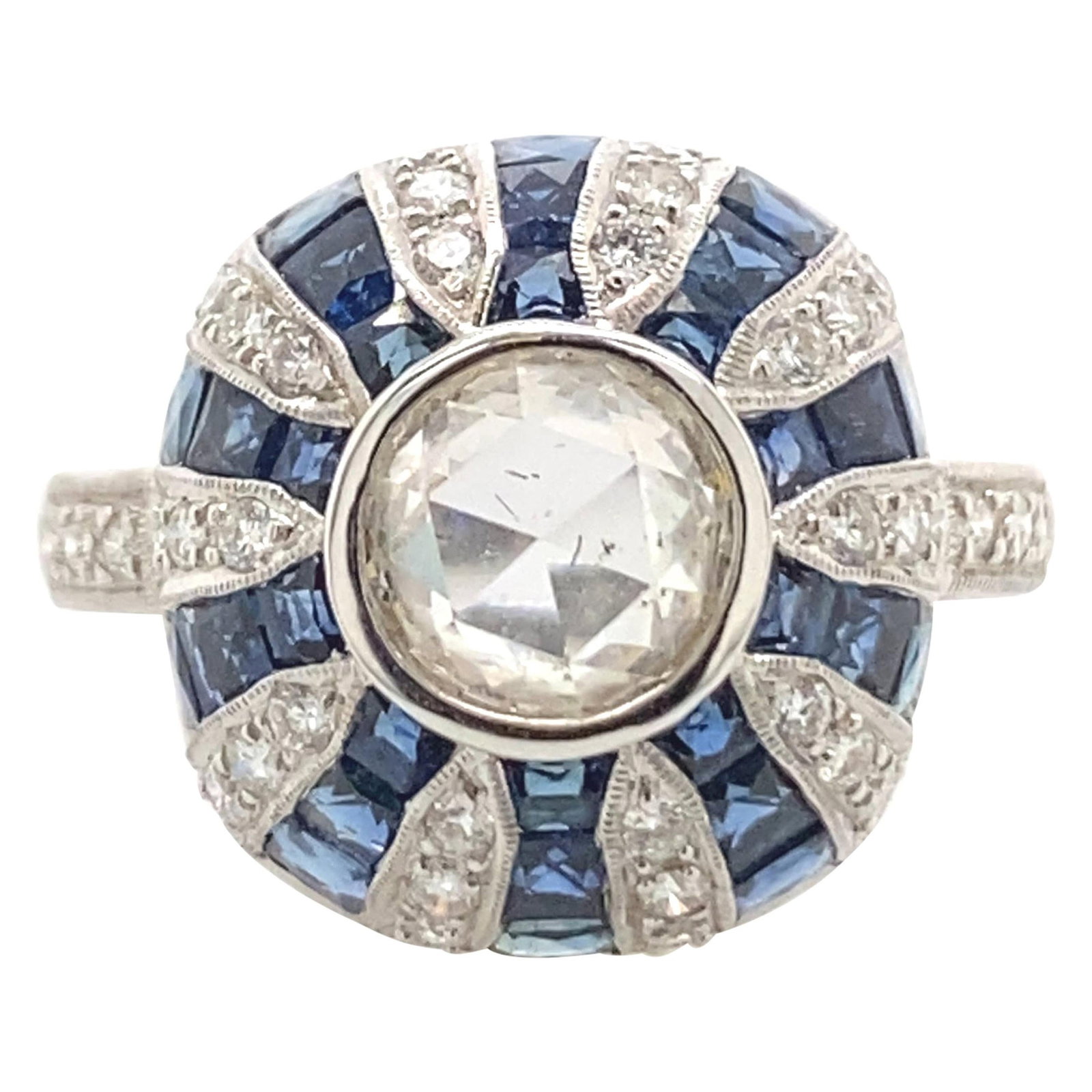 Art Deco Inspired 18k White Gold Diamond Sapphire Ring 2.38 ct: Art Deco Inspired 18k White Gold Diamond Sapphire Ring 2.38 ct This exquisite Art Deco inspired ring showcases a stunning combination of a 1.18 ct center rose cut diamond and 0.80 ct of French cut blu