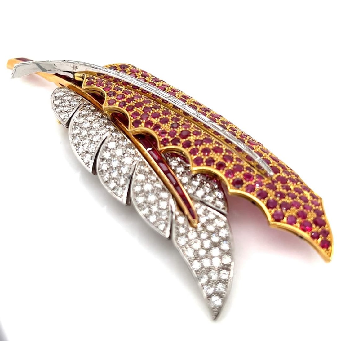 Stunning 18K Gold Diamond Ruby Brooch 107 Diamonds 4.80 Ct 8.00 Ct Rubies: Stunning 18K Gold Diamond Ruby Brooch 107 Diamonds 4.80 Ct 8.00 Ct Rubies This exquisite 18K Diamond and Ruby Brooch boasts a striking combination of brilliance and color. Weighing 39.9 grams, it is a