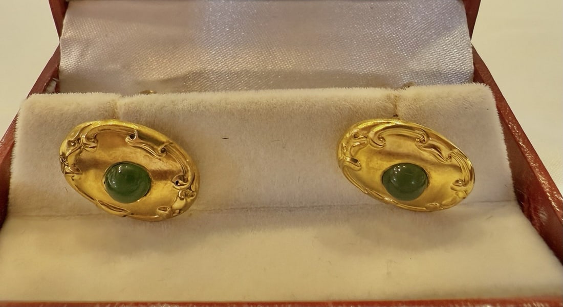 Riker Bros Art Nouveau 14K Gold Nephrite Jade Cufflinks: Riker Bros Art Nouveau 14K Gold Nephrite Jade Cufflinks This exquisite pair of Art Nouveau cufflinks showcases the remarkable craftsmanship of Riker Brothers. Made from 14k yellow gold, these cufflink