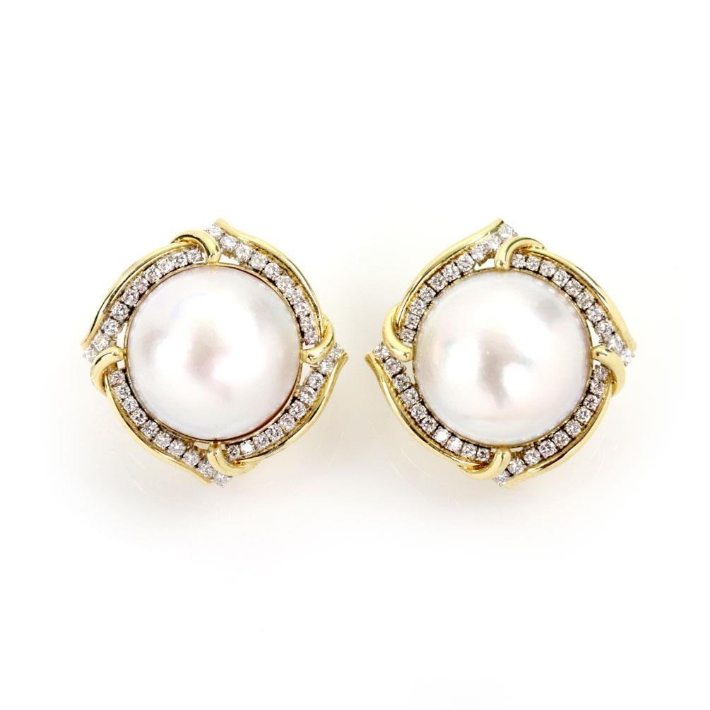 Estate 14k Gold Mabe Pearl 20.5mm Diamond Huggie Earrings: Estate 14k Gold Mabe Pearl 20.5mm Diamond Huggie Earrings Elevate your elegance with these stunning estate earrings, expertly crafted from 14k yellow gold with a polished finish. The earrings feature 