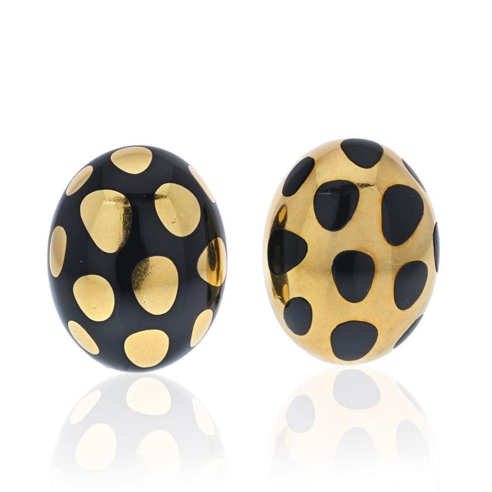 Tiffany & Co. 18K Yellow Gold Cummings Positive Negative Earrings Rare Design: Tiffany & Co. 18K Yellow Gold Cummings Positive Negative Earrings Rare Design Discover the elegance of these Tiffany & Co. earrings, meticulously crafted from 18K yellow gold. Weighing 20.9 grams and 