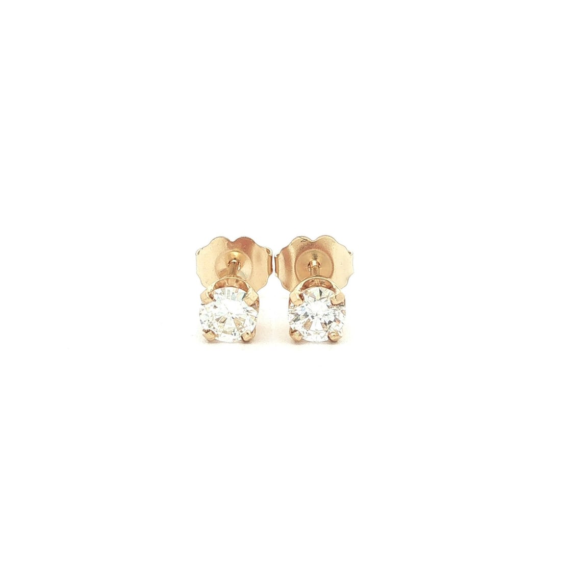 Unbranded 14k Yellow Gold Diamond Stud Earrings 0.56ctw: Unbranded 14k Yellow Gold Diamond Stud Earrings 0.56ctw Classic diamond stud earrings crafted in solid 14k yellow gold. This pair features two natural round brilliant cut diamonds in a four-prong stud