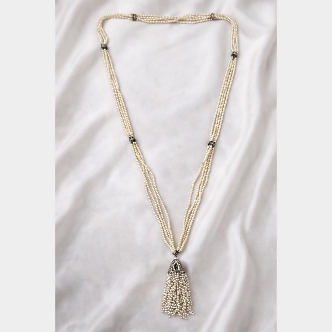 Natural Pearl Necklace with Platinum Chain and 14K Diamond Clasp Victorian Era: Natural Pearl Necklace with Platinum Chain and 14K Diamond Clasp Victorian Era This Victorian necklace features natural pearls strung together and secured with a 14K yellow gold clasp adorned with app