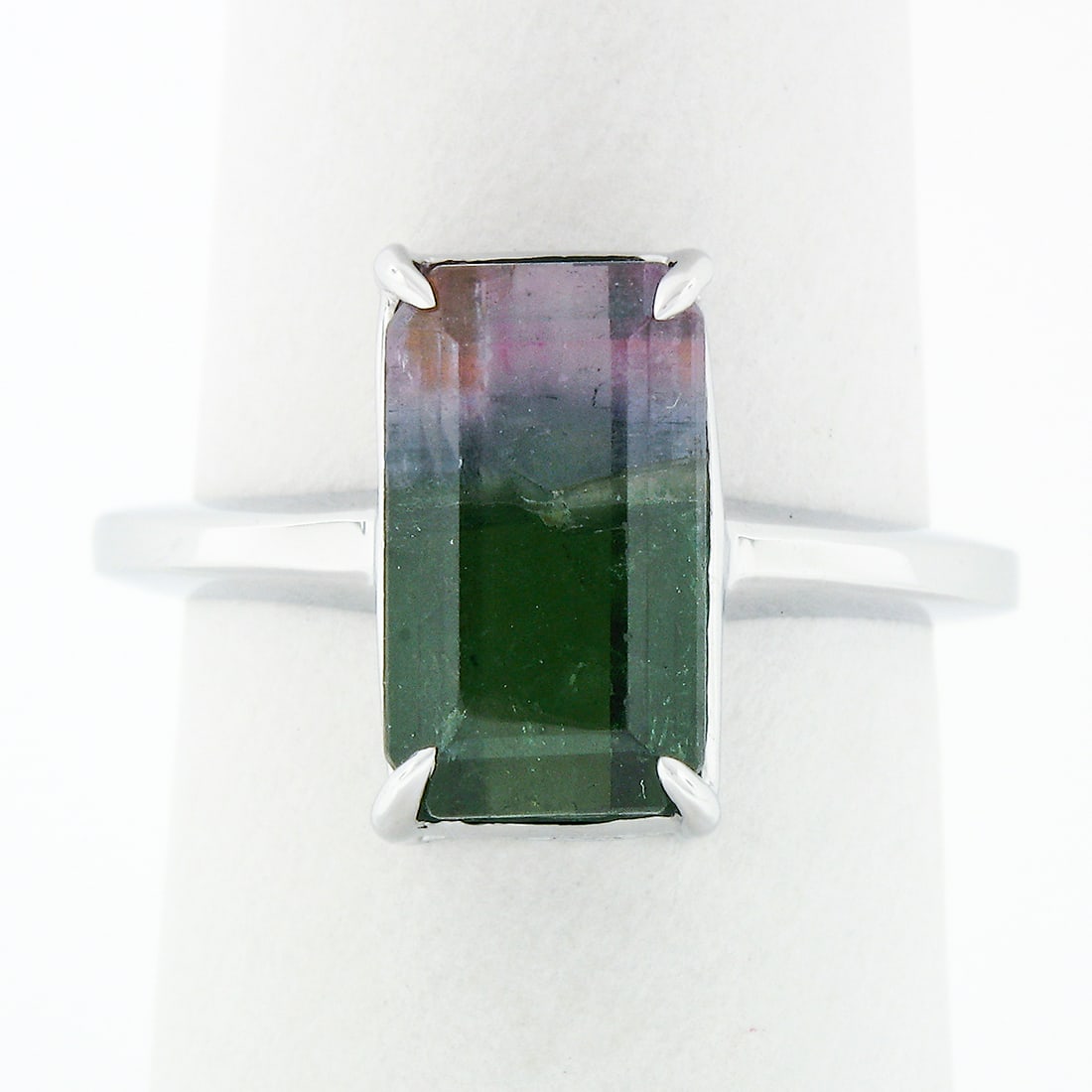 14k White Gold 3.44ct Emerald Cut Watermelon Tourmaline Solitaire Ring: 14k White Gold 3.44ct Emerald Cut Watermelon Tourmaline Solitaire Ring This exquisite 14k White Gold Solitaire Ring showcases a stunning emerald cut watermelon tourmaline at its center. Weighing appro