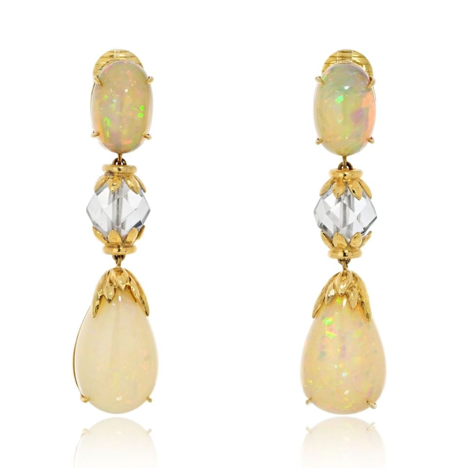 David Webb Newport Earrings Platinum 18K Gold Opal Rock Crystal: David Webb Newport Earrings Platinum 18K Gold Opal Rock Crystal Elevate your elegance with these stunning David Webb Newport Earrings, a true testament to luxury and craftsmanship. These exquisite ear