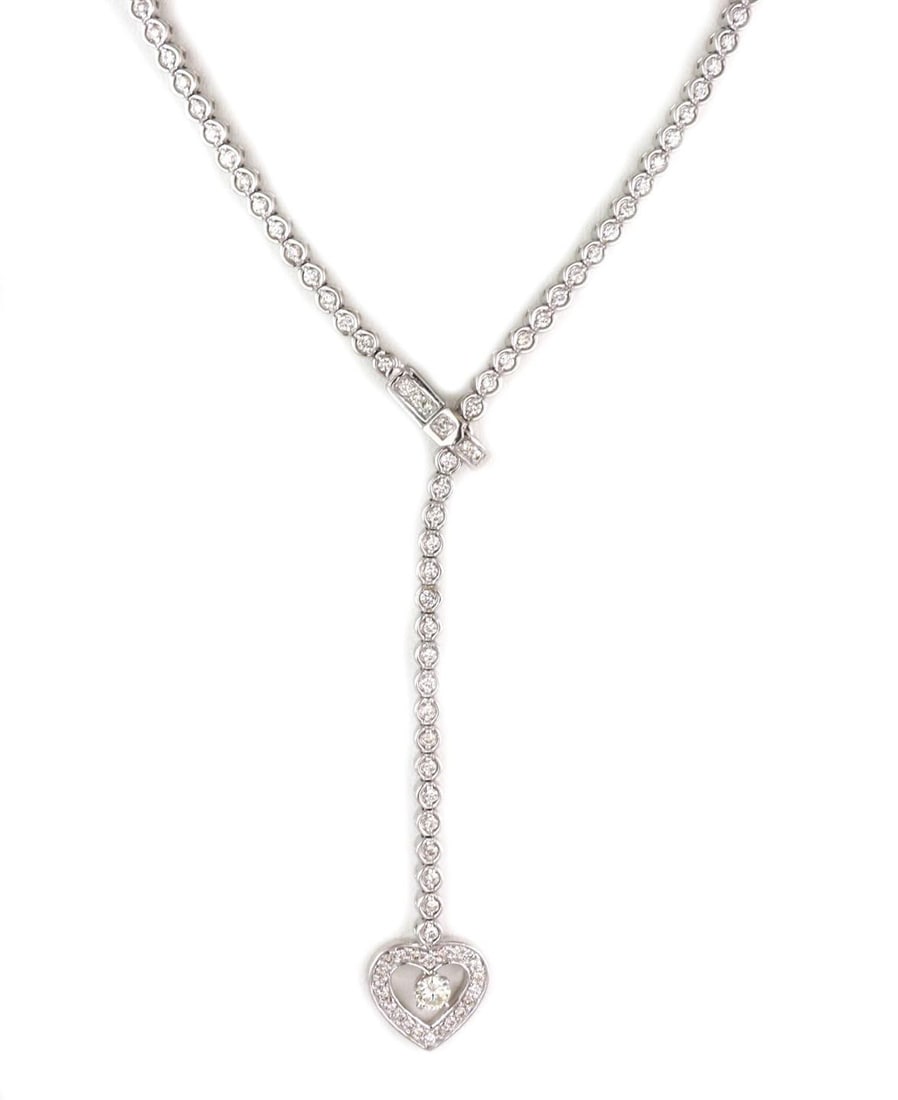14k White Gold Lariat Necklace Heart Pendant 2 Carats Diamonds: 14k White Gold Lariat Necklace Heart Pendant 2 Carats Diamonds This exquisite lariat necklace features a stunning heart pendant, expertly crafted from 14k white gold with a high-polished finish. The d