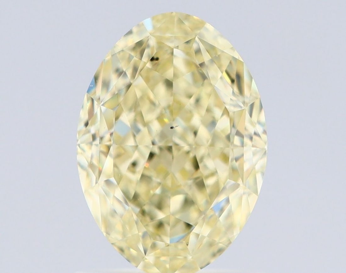 Loose Diamond - OVAL 1.52ct Fancy Light Yellow VS2: Loose Diamond - OVAL 1.52ct Fancy Light Yellow VS2 Source: Natural Shape: OVAL Carats: 1.52 Color: Fancy Light Yellow Certification: GIA Video: