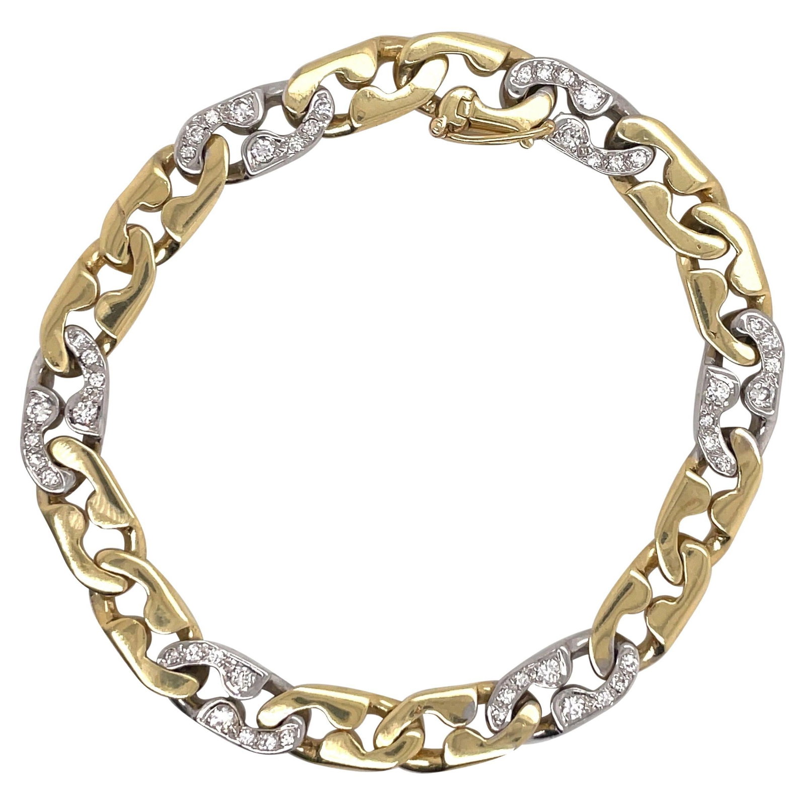 Harbor Diamonds 18K Two Tone Gold Diamond Link Bracelet 0.60 Carats: Harbor Diamonds 18K Two Tone Gold Diamond Link Bracelet 0.60 Carats This exquisite 18 Karat Two Tone Yellow and White Gold Diamond Link Bracelet showcases a stunning design from the 1990s. It features