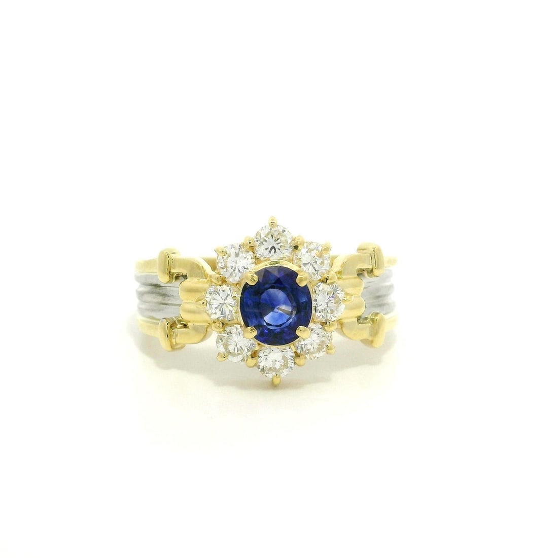 18k Yellow Gold Sapphire Diamond Flower Cluster Cocktail Ring: 18k Yellow Gold Sapphire Diamond Flower Cluster Cocktail Ring This exquisite cocktail ring features a stunning flower cluster design, crafted from solid 18k yellow gold with luxurious platinum sides. 