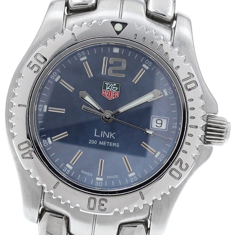 TAG Heuer Link WT121L Quartz Date Men's Steel Watch: TAG Heuer Link WT121L Quartz Date Men's Steel Watch This TAG Heuer Link Date Quartz men's wristwatch features a stainless steel case and bracelet with a blue shell dial. The watch is powered by a quar