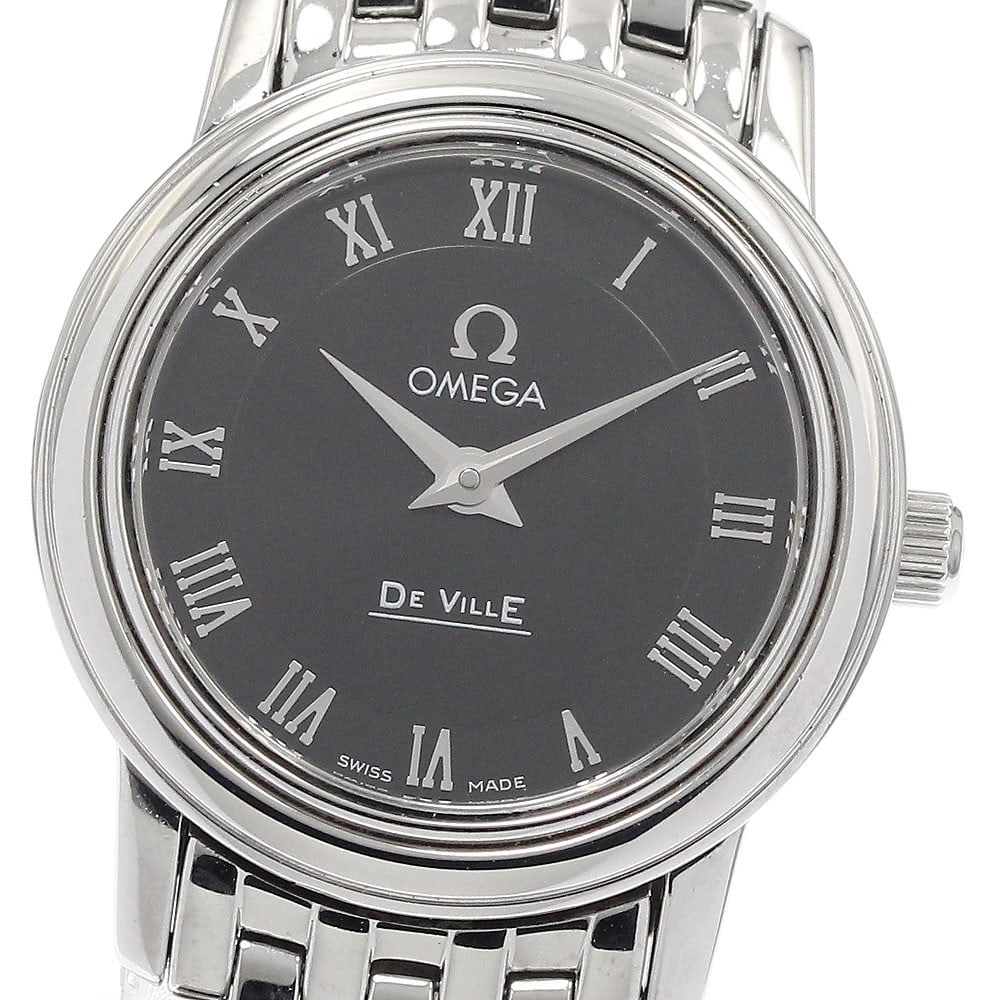 Omega De Ville Prestige 4570.52 Quartz Womens Steel Watch: Omega De Ville Prestige 4570.52 Quartz Womens Steel Watch This OMEGA De Ville Prestige Quartz women's wristwatch features a stainless steel case and bracelet with a sleek black dial. The watch is powe
