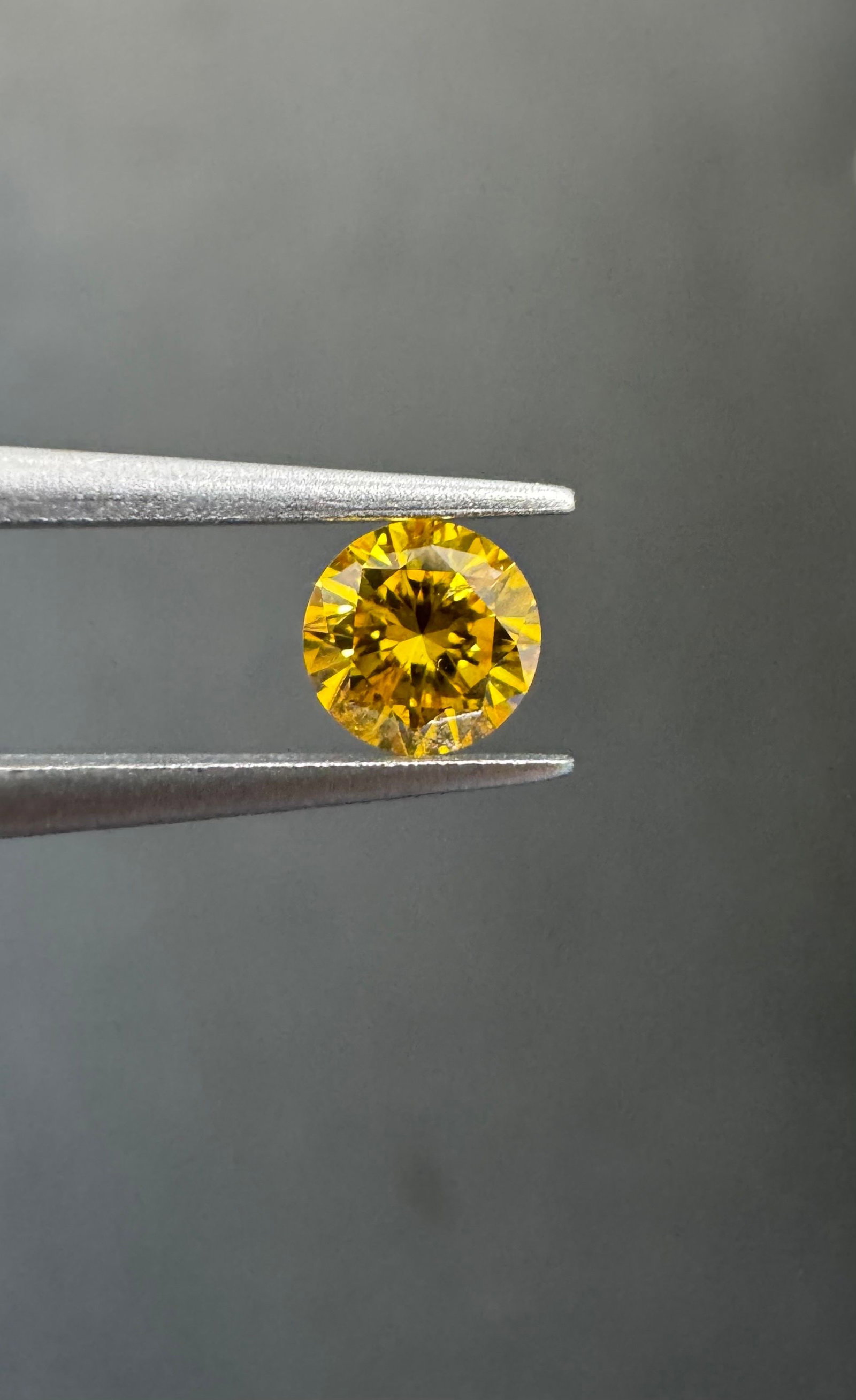 Loose Diamond - ROUND 0.27ct Fancy Vivid Orangey Yellow I1: Loose Diamond - ROUND 0.27ct Fancy Vivid Orangey Yellow I1 Source: Natural Shape: ROUND Carats: 0.27 Color: Fancy Vivid Orangey Yellow Certification: GIA PLEASE NOTE: Framed, Large, or heavy items do 